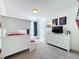 Bright ' bedroom featuring a modern bunk bed, playful decor, and ample natural light at 4191 Oaktree Drive, Davenport, FL 33837