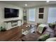 Inviting living room with TV, decor, and comfortable seating area at 4950 Nova Ave, St Cloud, FL 34773