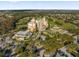 Aerial view of resort with expansive parking and green space at 7593 Gathering Dr # 608, Reunion, FL 34747