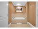 Relaxing bathtub in a well-appointed bathroom at 7593 Gathering Dr # 608, Reunion, FL 34747