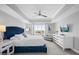 Luxurious main bedroom featuring a king-size bed and TV at 7593 Gathering Dr # 608, Reunion, FL 34747