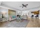 Elegant living room showcasing neutral tones and ample seating at 7593 Gathering Dr # 608, Reunion, FL 34747