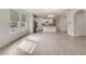 Bright dining area with tile flooring and views to the kitchen at 9553 Nautique Ln, Winter Garden, FL 34787