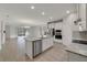 Modern kitchen with white cabinets and granite countertops at 9553 Nautique Ln, Winter Garden, FL 34787