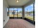 Screened patio with brick pavers and backyard view at 9553 Nautique Ln, Winter Garden, FL 34787