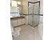 Bathroom with walk-in shower, bathtub, and dual sink vanity at 1069 Universal Rest Pl, Kissimmee, FL 34744