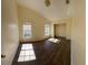 Bedroom showcasing wood floors, neutral walls and two windows for natural light at 1069 Universal Rest Pl, Kissimmee, FL 34744