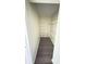 Walk-in closet features modern wood flooring and well-organized wire shelving for ample storage at 1069 Universal Rest Pl, Kissimmee, FL 34744