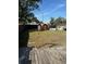 Large backyard with a deck that could be great for outdoor entertaining at 1700 Kentucky Ave, St Cloud, FL 34769