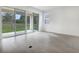 Spacious living room with sliding glass doors leading to the outdoor area at 1742 Carnelian St, Deland, FL 32720