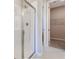 Modern bathroom with a walk-in shower and storage at 1744 Carnelian St, Deland, FL 32720