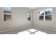 Well-lit bedroom featuring multiple windows at 1744 Carnelian St, Deland, FL 32720