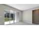 Bright dining room with sliding glass doors leading to the backyard at 1744 Carnelian St, Deland, FL 32720