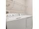 Laundry room with washer, dryer and shelving at 1744 Carnelian St, Deland, FL 32720
