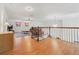 Upstairs loft area offers a cozy seating area and open space for relaxation and entertainment at 1810 Markham Woods Rd, Longwood, FL 32779