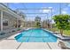 Screened-in pool with landscaping, and a well-manicured backyard at 1810 Markham Woods Rd, Longwood, FL 32779