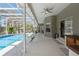 The extensive poolside patio is perfect for entertaining with summer kitchen and plenty of seating at 1810 Markham Woods Rd, Longwood, FL 32779