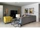 Spacious living room with gray sectional sofa, yellow accent chair, and large TV at 3850 Oakville Ave, Kissimmee, FL 34741