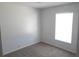 Comfortable bedroom featuring neutral carpet and a bright window, creating a welcoming space at 4815 Jay Dr, St Cloud, FL 34772