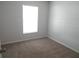 Comfortable bedroom featuring neutral carpet and a bright window, creating a welcoming space at 4815 Jay Dr, St Cloud, FL 34772
