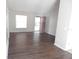 Bright living room featuring laminate flooring and large window providing lots of natural light at 4815 Jay Dr, St Cloud, FL 34772