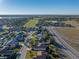 Aerial view of house and surrounding neighborhood at 545 Pintail Cir, Auburndale, FL 33823