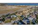 Aerial view of house and neighborhood near lake at 545 Pintail Cir, Auburndale, FL 33823