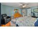 Serene Primary bedroom with hardwood floors, and ensuite bathroom at 545 Pintail Cir, Auburndale, FL 33823