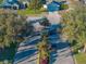Aerial view of community entrance with security gate at 545 Pintail Cir, Auburndale, FL 33823