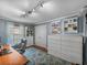 Home office with a desk, chair, and ample storage at 545 Pintail Cir, Auburndale, FL 33823