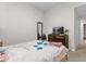 Bedroom with double bed, TV, and dresser at 8121 Roseville Blvd, Davenport, FL 33896