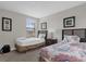 Bedroom with two beds and a window overlooking the landscape at 8121 Roseville Blvd, Davenport, FL 33896