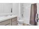 Clean bathroom with shower/tub combo and vanity at 965 Shady Tree Ln, Davenport, FL 33897