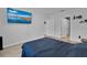 Bright bedroom with large TV and plenty of space at 965 Shady Tree Ln, Davenport, FL 33897