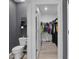 Walk-in closet with ample shelving and hanging space at 965 Shady Tree Ln, Davenport, FL 33897