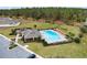 Community pool and playground near parking lot at 965 Shady Tree Ln, Davenport, FL 33897
