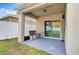 Cozy patio with seating and string lights at 965 Shady Tree Ln, Davenport, FL 33897