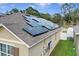 Home with solar panels on roof at 965 Shady Tree Ln, Davenport, FL 33897