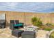 Landscaped backyard with fire pit and seating area at 113 Promenade Ct, Auburndale, FL 33823