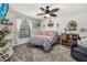 Cozy bedroom with a comfortable bed and plenty of natural light at 113 Promenade Ct, Auburndale, FL 33823
