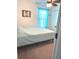 Light-filled bedroom with a large window and comfortable neutral carpet at 113 Promenade Ct, Auburndale, FL 33823