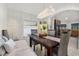 Dining area with dark wood table and built-in bench at 113 Promenade Ct, Auburndale, FL 33823