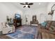 Spacious living room with fireplace and plenty of natural light at 113 Promenade Ct, Auburndale, FL 33823