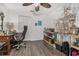 Home office with a desk, chair, and decorative plants at 113 Promenade Ct, Auburndale, FL 33823