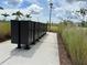 Row of black community mailboxes at 14827 Milfoil Ave, Orlando, FL 32827