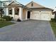 Two-story house with a two-car garage at 14827 Milfoil Ave, Orlando, FL 32827