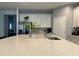 Modern kitchen island with white cabinets and quartz countertop at 14827 Milfoil Ave, Orlando, FL 32827