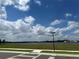 Scenic view of a lake from a residential area at 14827 Milfoil Ave, Orlando, FL 32827