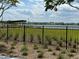 Peaceful lakefront view with a gazebo at 14827 Milfoil Ave, Orlando, FL 32827