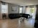 Relaxing living room with sectional sofa and neutral decor at 14827 Milfoil Ave, Orlando, FL 32827